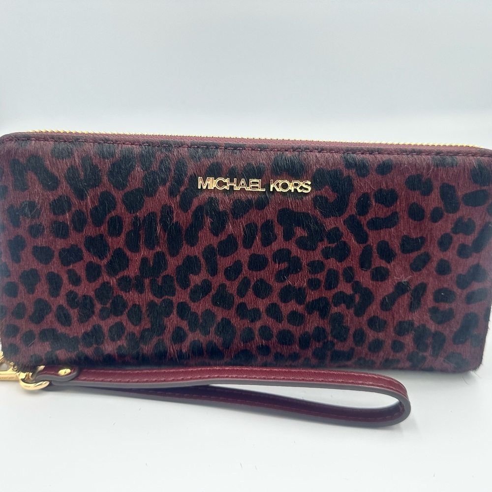 Michael Kors Jet Set large continental wallet Calf hair animal print oxblood